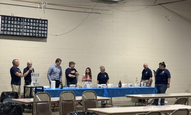 Rotarians getting ready to serve Ice Cream.